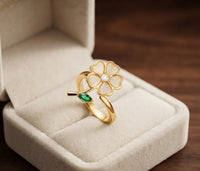 Emerald Flower and Leaf Spinner Ring